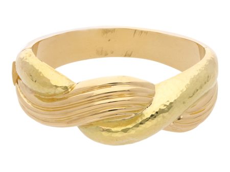 Brazalete articulado en oro amarillo 18 kilates. For Sale