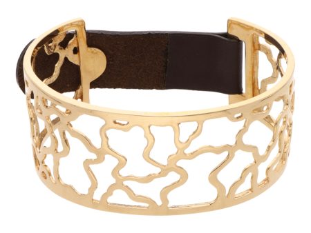 Brazalete calado motivo osos con correa de piel en oro amarillo 18 kilates. Fashion