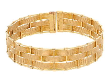 Brazalete abierto en oro amarillo 14 kilates. Online Sale