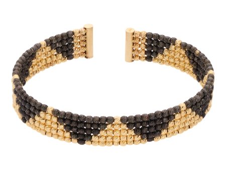 Pulsera hechura italiana abierta boleada con esmalte en oro amarillo 14 kilates. Supply