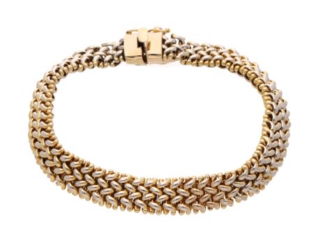 Pulsera hechura italiana en oro dos tonos 14 kilates. on Sale